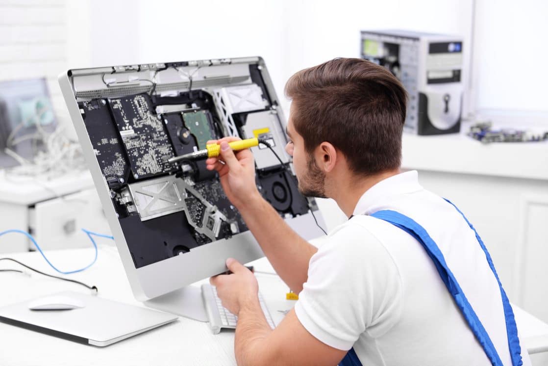 Man working on circuit board