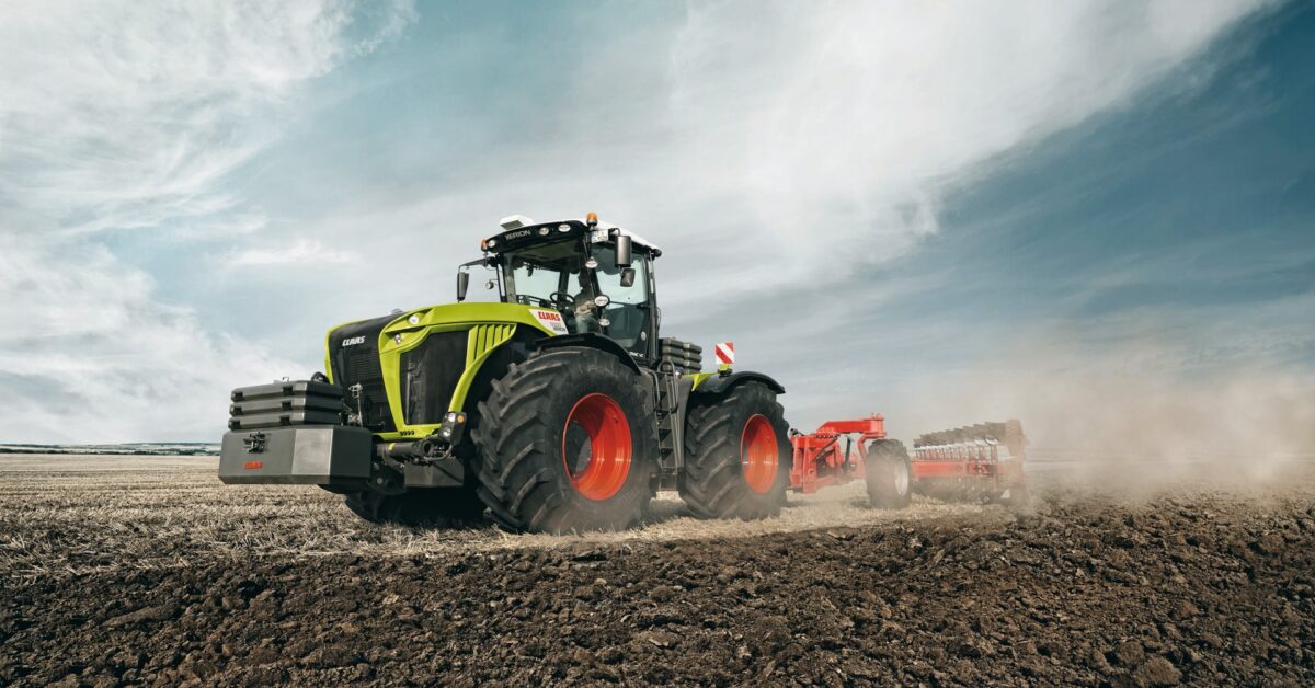 CLAAS tractor being operated in field
