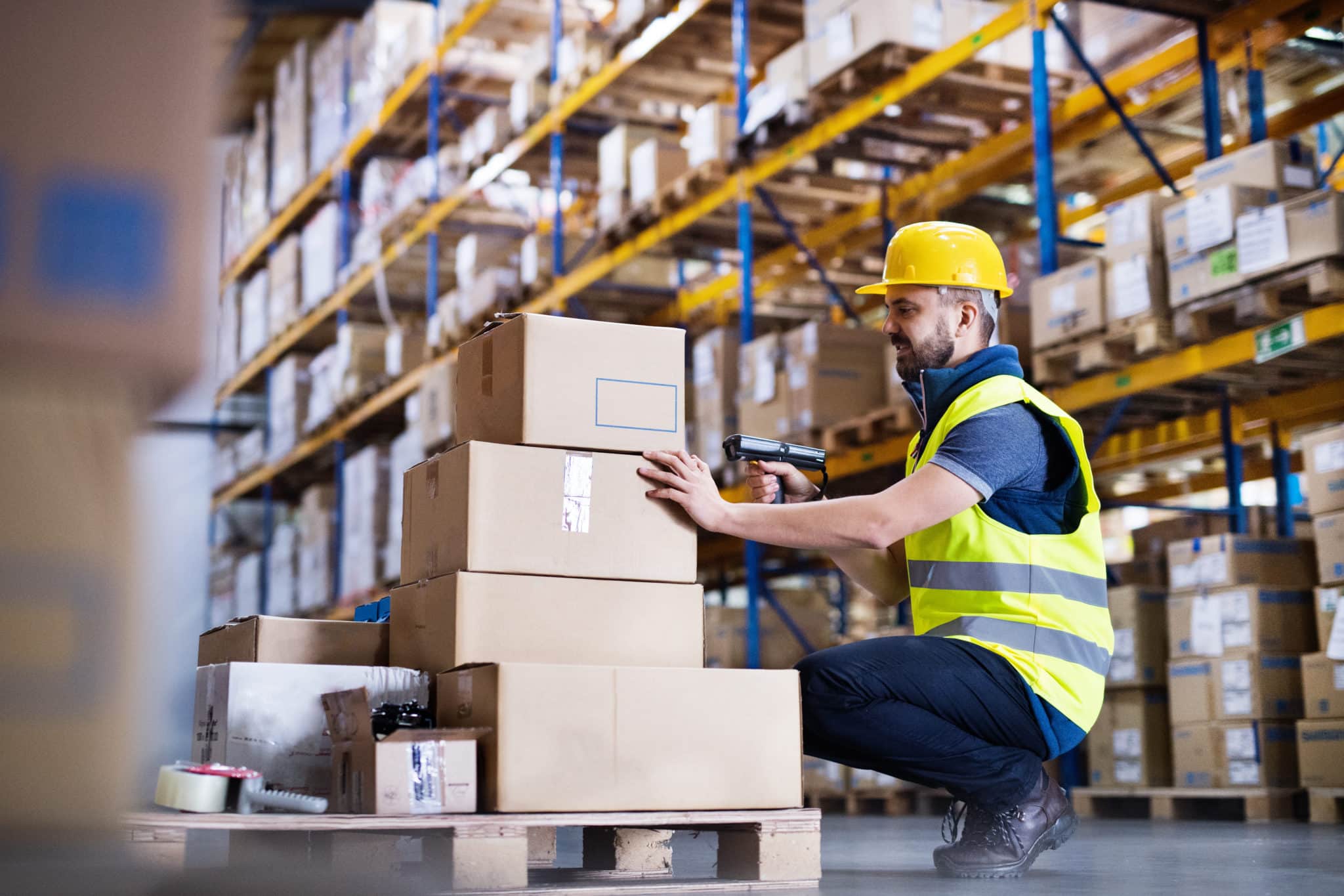 worker with barcode scanner