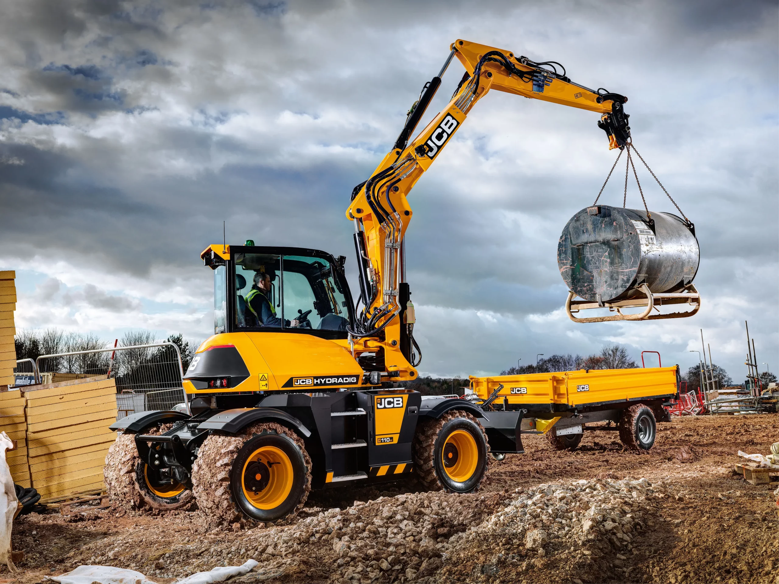 JCB hydradig lifting container