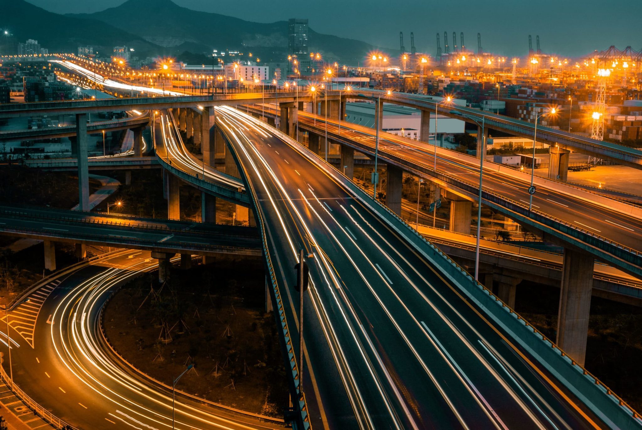 Highway with overpasses weaving. Lines drawn to simulate moving cars over time