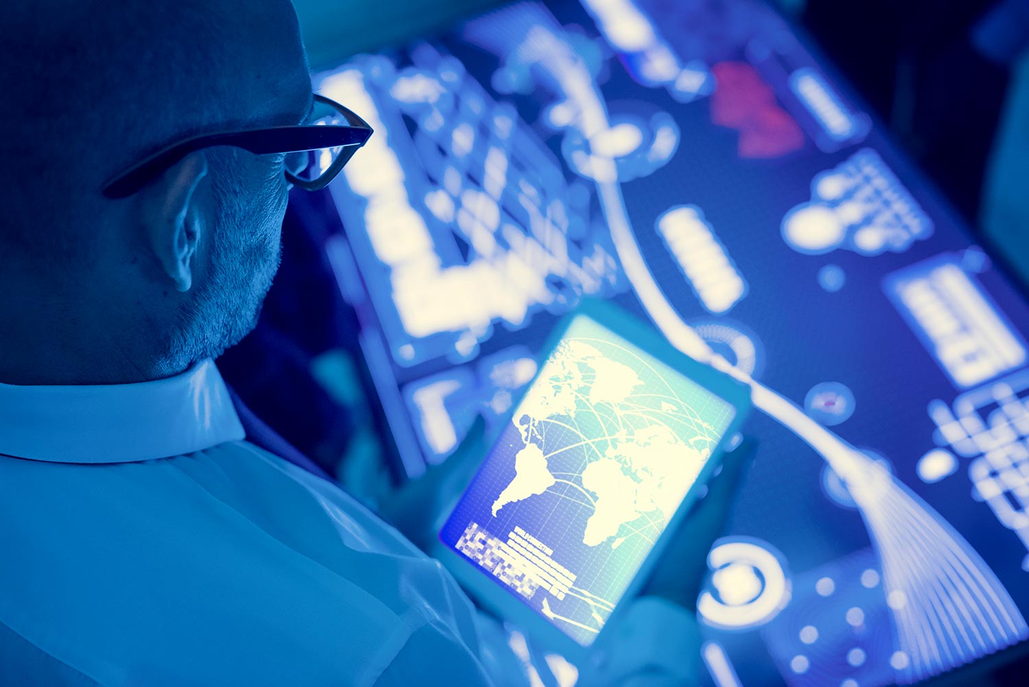 Man holding tablet showing a map