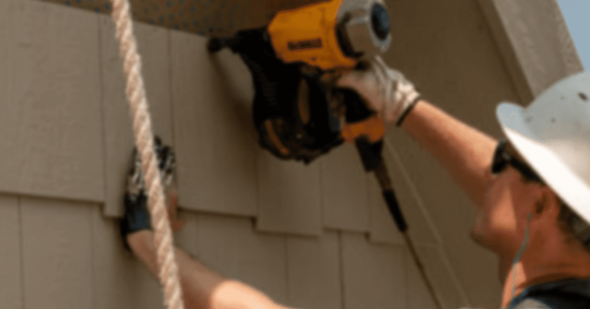 Technician working using nail gun