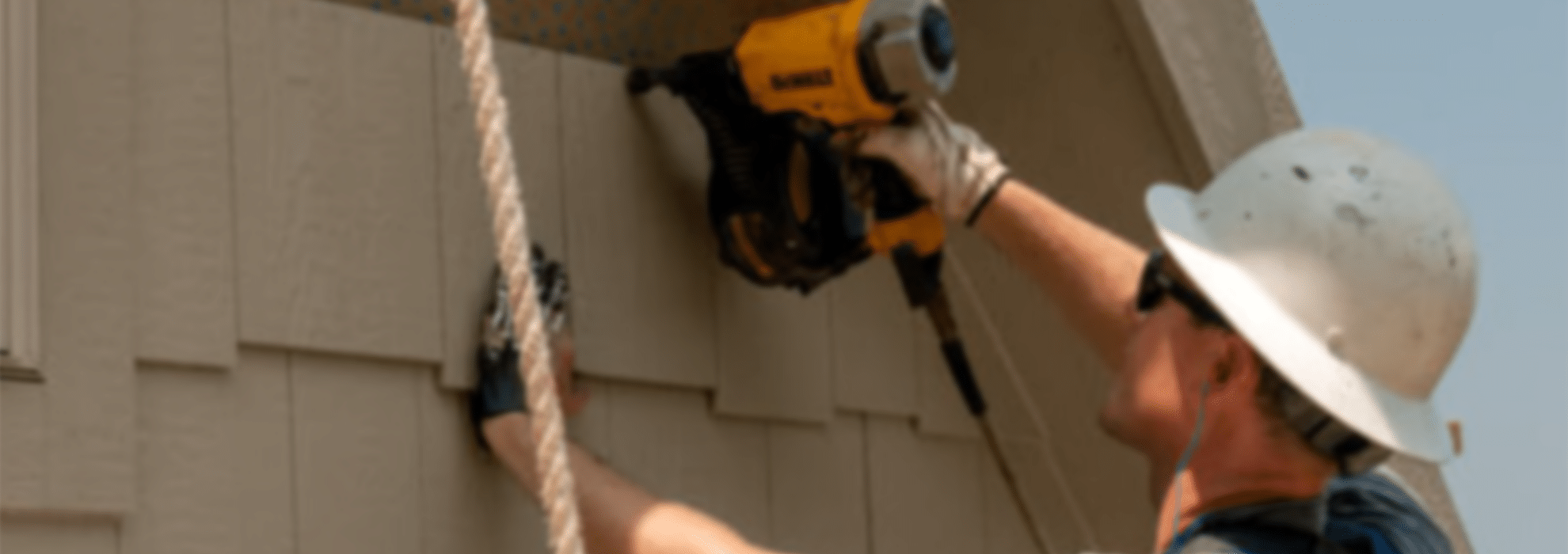 Technician working using nail gun